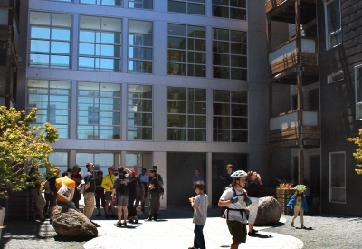 Bike tour exploring the courtyard at 8th & Howard/SOMA Studios in San Francisco, Ca.