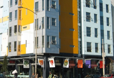 Exterior elevation with grocery store entrance at 8th & Howard/SOMA Studios in San Francisco, Ca.