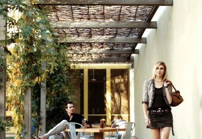 Women walking under the lattice at Hotel Healdsburg in Healdsburg, Ca.