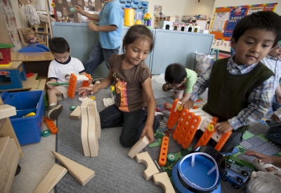 Children playing in a classroom at Paseo Senter in San Jose, California.