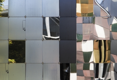 Close up of matte and shiny reflective tiles on Zero Cottage in San Francisco.. 