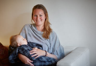 Resident with her child at Bayview Hill Gardens in San Francisco, Ca.