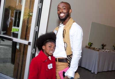 Resident and her daughter at the grand opening of Station Center Family Housing in Union City, Ca