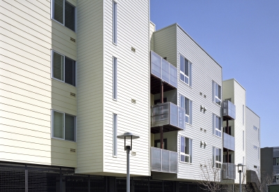 Exterior view of the pedestrian mews at Ironhorse at Central Station in Oakland, California.