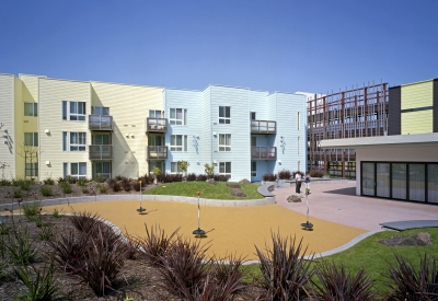 Exterior view of residential courtyard at Ironhorse at Central Station in Oakland, California.