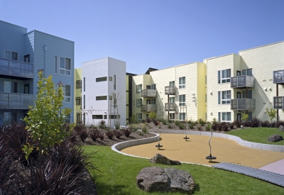 Exterior view of the resident courtyard at Ironhorse at Central Station in Oakland, California.