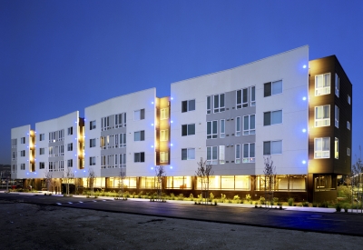 Exterior view at dusk of the north elevation of Ironhorse at Central Station in Oakland, California.