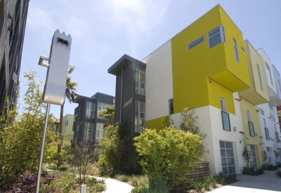 Bird house sculpture and townhouses at Blue Star Corner in Emeryville, Ca.