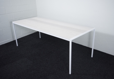 Summit table with a white bleached top.