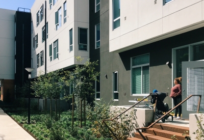 Ground level residential stoops along the mid-block passage at Five88 in San Francisco.