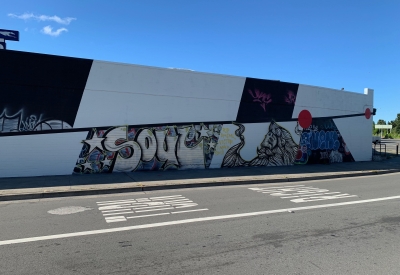 Street art beginning to appear on the side of David Baker Architects in Oakland, California.