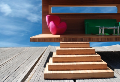 Detail view of the wooden stairs on the Modularean Eco House.