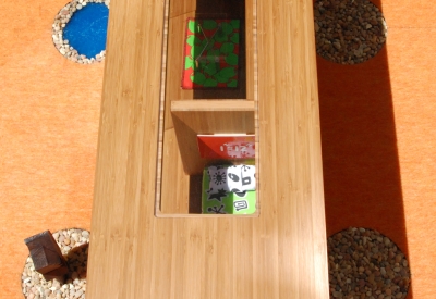 View of the top of Modularean Eco House and the "skyllights" looking into the two rooms.