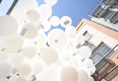 Looking up at the white balloons for Wishing Cloud.