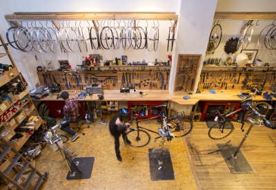 Interior view of the bicycle repair center inside Huckleberry Bicycles in San Francisco.