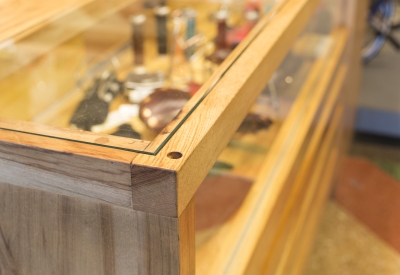 Detail of wood display case inside Huckleberry Bicycles in San Francisco.