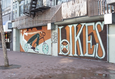 Exterior street view of the mural on the outside of Huckleberry Bicycles in San Francisco.