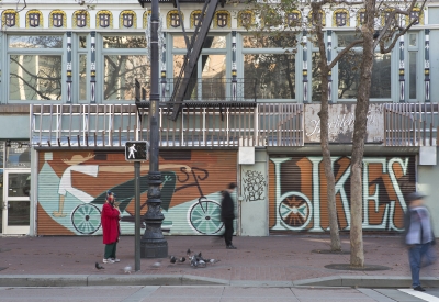 Exterior street view of the mural on the outside of Huckleberry Bicycles in San Francisco.