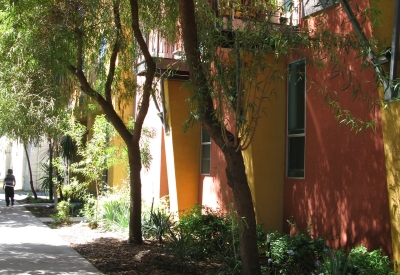 Sidewalk view with Pensione K on the right in Sacramento, California.