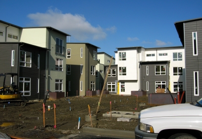 Townhouses under construction at Tassafaronga Village in East Oakland, CA.