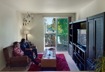 Living room facing the balcony at La Valentina Station in Sacramento, Ca.