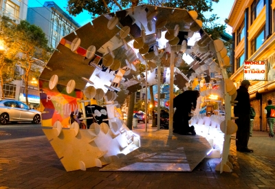 DBA's installation, PeepSHOW, for the Market Street Prototyping Festival in San Francisco at dusk.