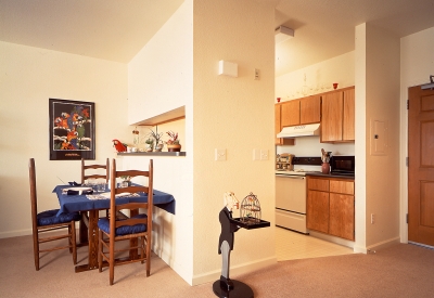 Interior of a unit kitchen and dining room at Moonridge Village in Santa Cruz, California.