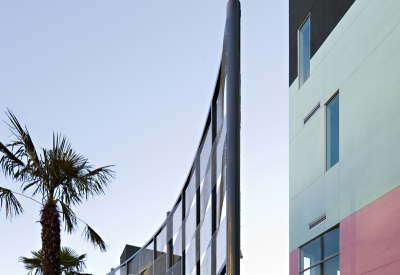 Exterior view of the community rooms woven screen at Paseo Senter in San Jose, California.