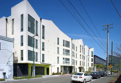 Exterior view down Pine Street of Pacific Cannery Lofts in Oakland, California.