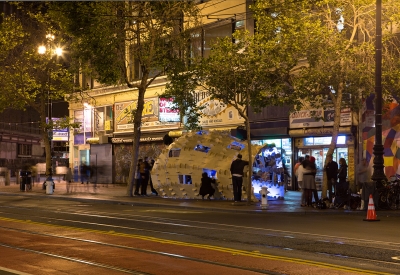 DBA's installation, PeepSHOW, for the Market Street Prototyping Festival in San Francisco at dusk.