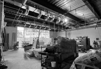 Black and white image  of the interior during the construction of Local 38 Plumbers Union Hall in San Francisco. 