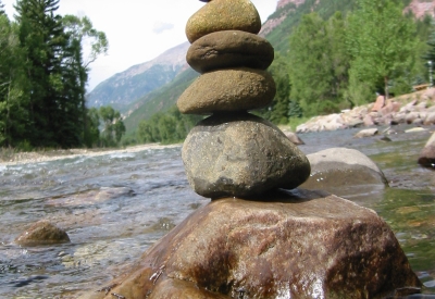 Rocks stacked up in a river near Redstone Cabin in Redstone Colorado.