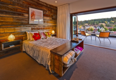 Interior view of a bedroom at Truckee Prototype Mixed-Use Townhouse in Truckee, California.