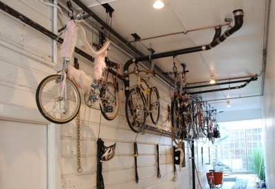 Bikes hanging in the garage at Shotwell Design Lab in San Francisco.