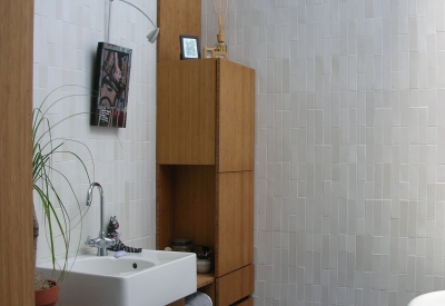 Bathroom sink and shelving inside Shotwell Design Lab in San Francisco.