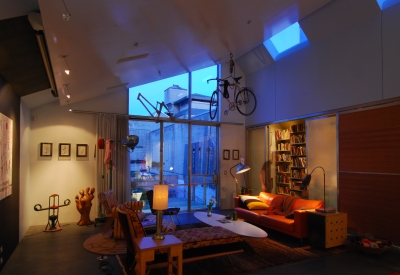 Interior of the living space at Shotwell Design Lab in San Francisco at dusk..
