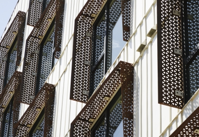 Random Batten Siding (RBS) and corten perforated sunshades detail at The Union in Oakland, Ca. 
