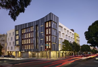 Dusk view of Richardson Apartments corner bay in San Francisco.