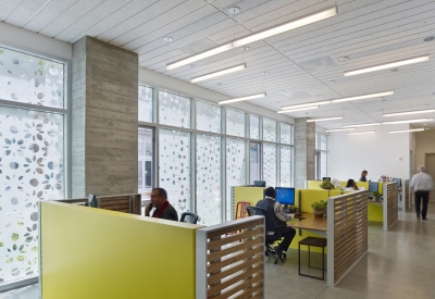 On-site clinic, with staff at work stations inside Richardson Apartments in San Francisco.