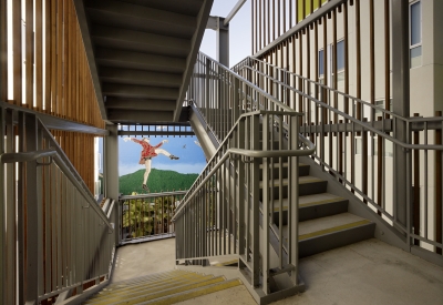 View on landing of open-air stair into the courtyard at Richardson Apartments in San Francisco.