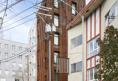 Exterior corner view of Tahanan Supportive Housing in San Francisco.