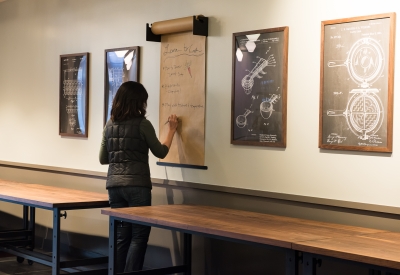 Custom adjustable height tables at Civic Kitchen in San Francisco.