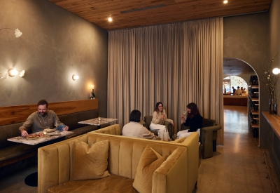 People sitting in the Champagne Room inside Golden Age Wine in Birmingham, Alabama.