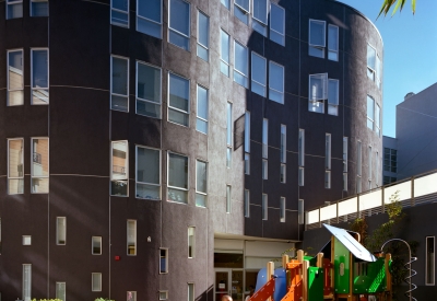 Children playing at the onsite daycare playground at 8th & Howard/SOMA Studios in San Francisco, Ca.