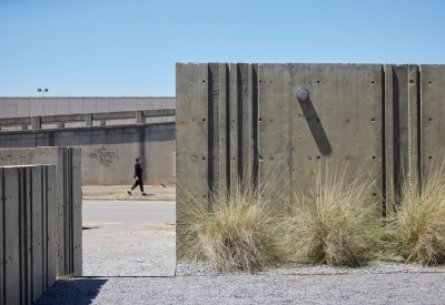 View of the rear courtyard with texture concrete walls at the Bandsaw Building in Birmingham, Alabama.