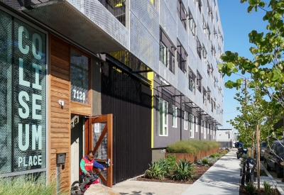 Exterior view of the entryway to Coliseum Place in Oakland, California.