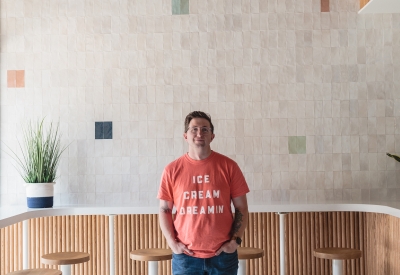 Man standing inside Big Spoon Creamery in Huntsville, Alabama.