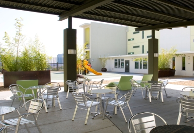 Seating area and playground of the rooftop of Delmas Park in San Jose, California.