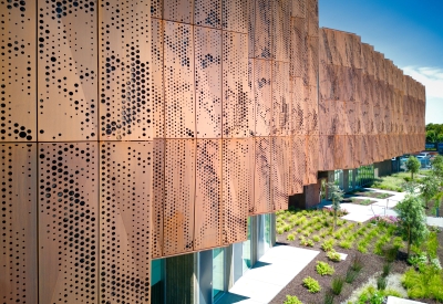 Detail view of the weathering cor-ten facade sunshades on the exterior of Blue Oak Landing in Vallejo, California.