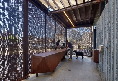 View of one of the bathrooms with a man washing his hands at City Walk in Birmingham, Alabama.